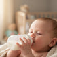 Baby bottles with a milk warmer and heater, showing structure and safety features.