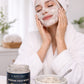 Woman applying face mask with LAVAH GLO product in the background